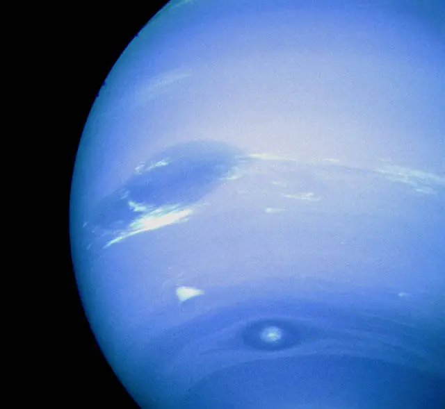 Close up of a bright blue planet